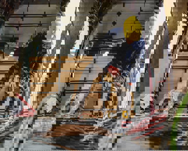 Electrician preparing cables and equipment 