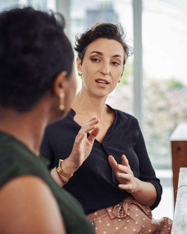 Woman explain something to someone using her hands