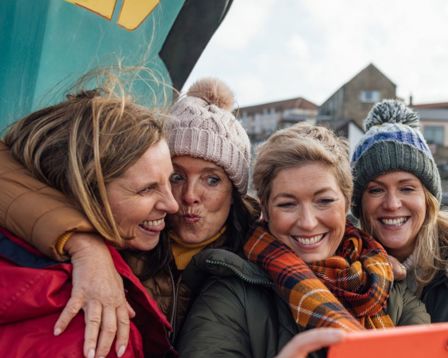 Group of woman taking a selfie together