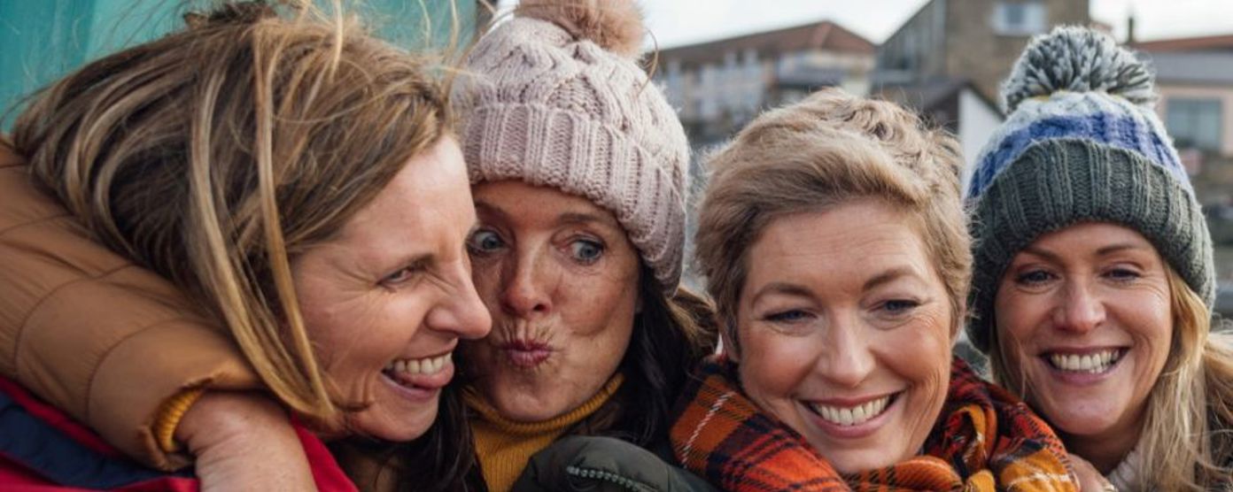 Group of woman taking a selfie together