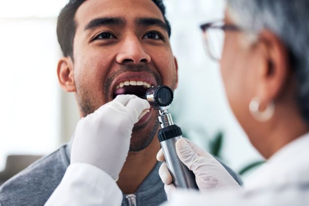 Male having a health screening assessment