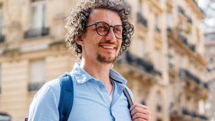 Male with a backpack abroad.jpg