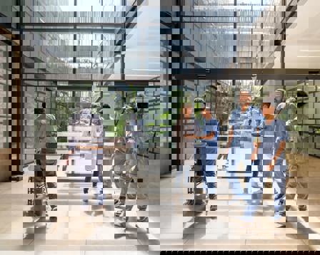 Hospital corridor staff and patients